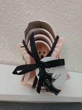 Rae Dunn Ghost Stacked Pink Measuring Cups with Black Ribbon